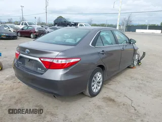 2017 Toyota Camry Hybrid LE with VIN 4T1BD1FK9HU216117, listed as a IAAI auction lot 41710989 with 99,595 mi miles. Bid and sale history available at carsss.com. Image 4.