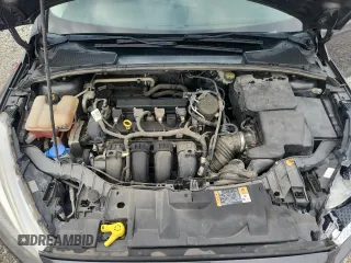 2016 Ford Focus SE z VIN 1FADP3F28GL267618, wystawiony jako Copart lot #58920765 z przebiegiem 157 980 mil mil oraz Szkoda całkowita • Salvage title. Historia ofert i sprzedaży dostępna na DreamBid. Obrazek 11.