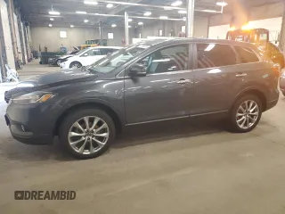 2014 Mazda CX-9 Grand Touring z VIN JM3TB3DAXE0435733, wystawiony jako Copart lot #57785925 z przebiegiem 128 522 mil mil oraz Czysty tytuł • Clean title. Historia ofert i sprzedaży dostępna na DreamBid. Obrazek 1.