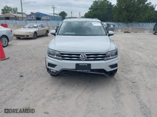 2018 Volkswagen Tiguan SEL with VIN 3VV2B7AX1JM006316, listed as a IAAI auction lot 40084803 with 91,459 mi miles. Bid and sale history available at carsss.com. Image 12.