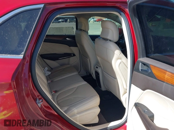 2015 Lincoln MKC with VIN 5LMCJ1A93FUJ30944, listed as a IAAI auction lot 41835261 with 142,324 mi miles. Bid and sale history available at carsss.com. Image 8.