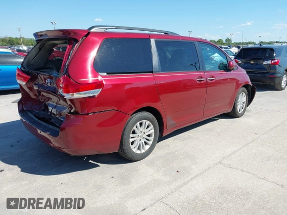 2012 Toyota Sienna XLE AAS with VIN 5TDYK3DC8CS258612, listed as a IAAI auction lot 41899311 with 75,779 mi miles and . Bid and sale history available at DreamBid. Image 4.