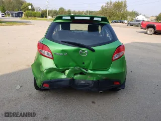 2011 Mazda Mazda2 Sport with VIN JM1DE1HY3B0121949, listed as a Copart auction lot 66958854 with 0 mi miles and Salvage Title. Bid and sale history available at carsss.com. Image 6.