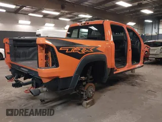 2022 Ram 1500 TRX with VIN 1C6SRFU9XNN149317, listed as a IAAI auction lot 41804066 with 42,856 mi miles. Bid and sale history available at carsss.com. Image 4.