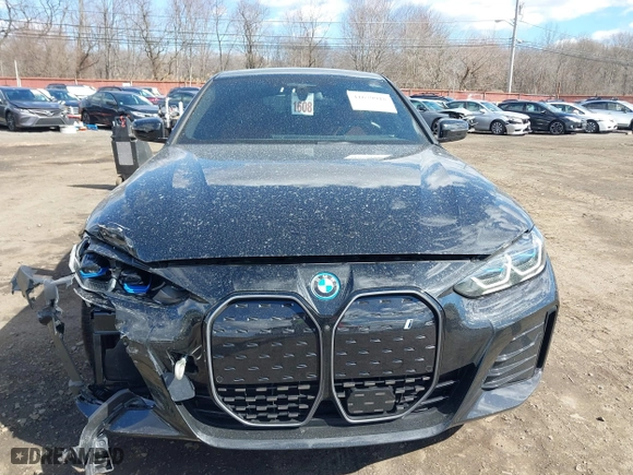 2024 BMW i4 xDrive40 with VIN WBY83FB04RFT19615, listed as a IAAI auction lot 41679918 with 3,883 mi miles. Bid and sale history available at carsss.com. Image 12.