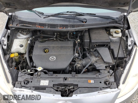2012 Mazda 5 Grand Touring с VIN JM1CW2DL2C0101833, выставлен на аукционе Copart как лот 60362815 с пробегом 164 556 миль миль и Чистый • Clean title. История ставок и продаж доступна на DreamBid. Изображение 12.