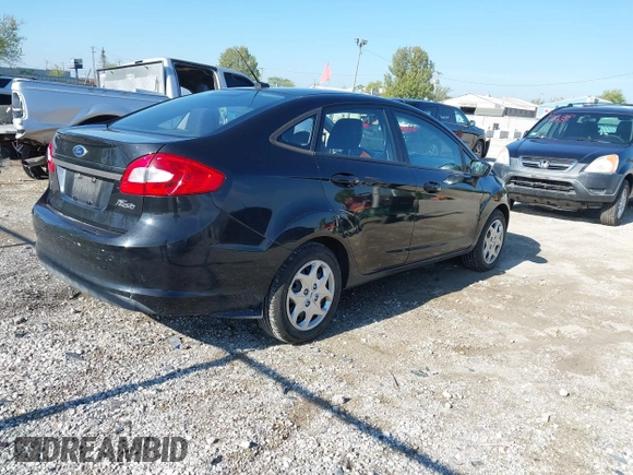 2011 Ford Fiesta SE with VIN 3FADP4BJ4BM144991, listed as a IAAI auction lot 42202406 with 67,448 mi miles and . Bid and sale history available at carsss.com. Image 4.