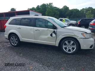 2013 Dodge Journey Crew with VIN 3C4PDDDG9DT685464, listed as a IAAI auction lot 42641982 with 155,901 mi miles and . Bid and sale history available at DreamBid. Image 13.