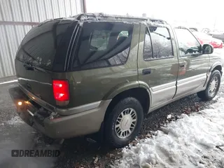 2001 GMC Jimmy SLE with VIN 1GKDT13W212171101, listed as a IAAI auction lot 41546523 with 229,471 mi miles. Bid and sale history available at carsss.com. Image 4.
