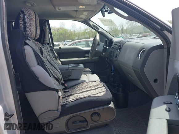 2005 Ford F-150 STX with VIN 1FTRX14W85NA00409, listed as a IAAI auction lot 42125903 with 160,230 mi miles and . Bid and sale history available at DreamBid. Image 5.