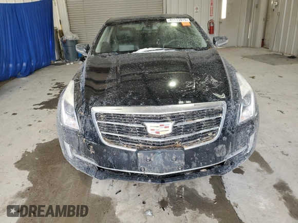 2015 Cadillac ATS Luxury AWD z VIN 1G6AH1RX8F0141381, wystawiony jako Copart lot #45933815 z przebiegiem 142 161 mil mil oraz Szkoda całkowita • Salvage title. Historia ofert i sprzedaży dostępna na DreamBid. Obrazek 5.