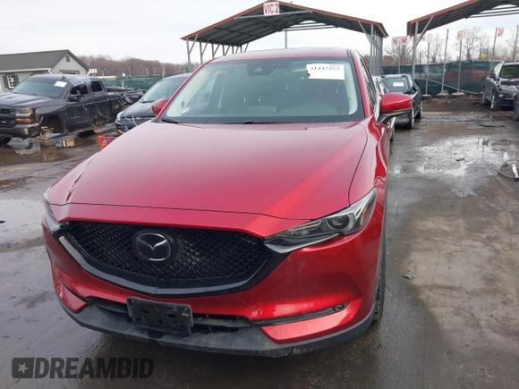 2018 Mazda CX-5 Grand Touring with VIN JM3KFBDM8J0406276, listed as a IAAI auction lot 41447355 with 70,772 mi miles. Bid and sale history available at carsss.com. Image 12.