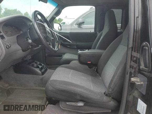 2003 Ford Ranger XL Fleet with VIN 1FTYR44U33PB76954, listed as a Copart auction lot 59866174 with 180,629 mi miles and Salvage title. Bid and sale history available at DreamBid. Image 7.