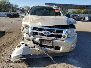 2011 Ford Escape XLT with VIN 1FMCU0D70BKA56239, listed as a Copart auction lot 69469464 with 59,782 mi miles and Salvage Title. Bid and sale history available at carsss.com. Image 4.