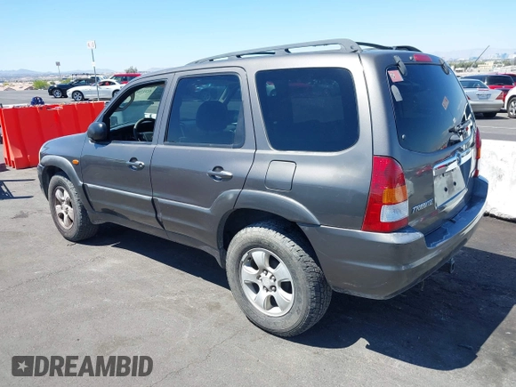 2003 Mazda Tribute ES with VIN 4F2CZ96113KM52877, listed as a IAAI auction lot 42217251 with 218,475 mi miles and . Bid and sale history available at DreamBid. Image 3.