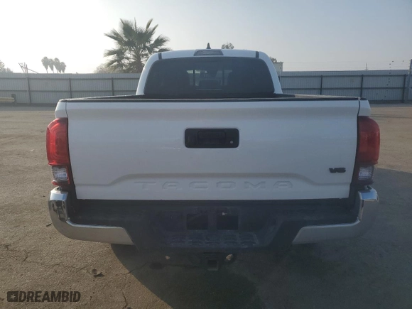 2023 Toyota Tacoma 2WD SR5 with VIN 3TMBZ5DN0PM039406, listed as a Copart auction lot 83616014 with 33,846 mi miles and Salvage Title. Bid and sale history available at carsss.com. Image 6.