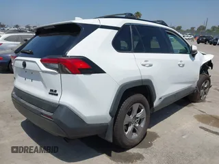 2022 Toyota RAV4 Hybrid XLE with VIN 2T3RWRFV9NW130472, listed as a IAAI auction lot 40990707 with 156,174 mi miles and . Bid and sale history available at DreamBid. Image 4.
