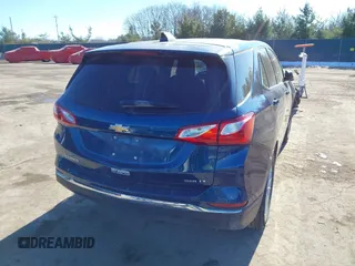 2020 Chevrolet Equinox LT with VIN 2GNAXUEV6L6185542, listed as a IAAI auction lot 41409792 with 56,533 mi miles and . Bid and sale history available at DreamBid. Image 4.