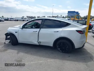 2023 Tesla Model Y Long Range with VIN 7SAYGDEE9PA026005, listed as a IAAI auction lot 41895223 with 43,813 mi miles and . Bid and sale history available at DreamBid. Image 14.