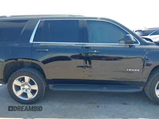 2020 Chevrolet Tahoe LS with VIN 1GNSCAKCXLR293278, listed as a IAAI auction lot 41973191 with 61,907 mi miles and . Bid and sale history available at DreamBid. Image 13.