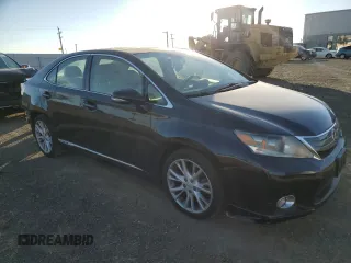 2010 Lexus HS 250h with VIN JTHBB1BA1A2017523, listed as a Copart auction lot 80086154 with 125,421 mi miles and Salvage Title. Bid and sale history available at DreamBid. Image 4.