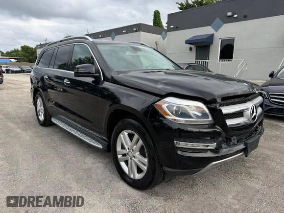 2016 Mercedes-Benz GL with VIN 4JGDF6EE1GA625384, listed as a Copart auction lot 77045634 with 104,938 mi miles and Salvage Title. Bid and sale history available at carsss.com. Image 4.