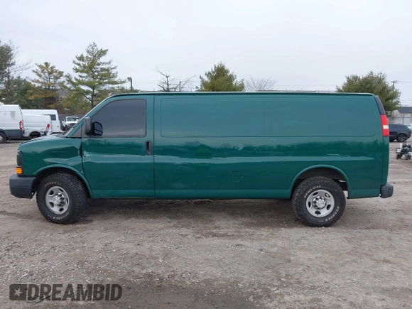 2014 Chevrolet Express Cargo Van with VIN 1GCWGGCAXE1198199, listed as a IAAI auction lot 41242821 with 274,446 mi miles. Bid and sale history available at carsss.com. Image 14.