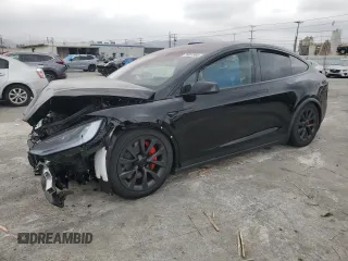 2024 Tesla Model X Plaid with VIN 7SAXCBE68RF449524, listed as a Copart auction lot 76821964 with Not Provided miles and Salvage Title. Bid and sale history available at DreamBid. Image 1.