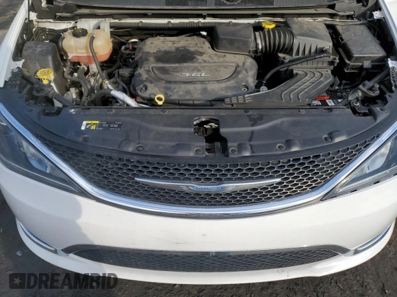 2018 Chrysler Pacifica Touring L with VIN 2C4RC1BGXJR131734, listed as a Copart auction lot 87932215 with 72,072 mi miles and Salvage Title. Bid and sale history available at DreamBid. Image 12.
