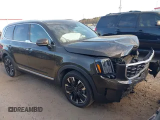 2023 Kia Telluride SX z VIN 5XYP5DGC8PG345837, wystawiony jako IAAI lot #41897555 z przebiegiem 35 921 mil mil oraz . Historia ofert i sprzedaży dostępna na DreamBid. Obrazek 1.