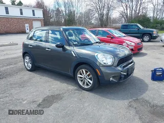 2014 MINI Countryman S with VIN WMWZC3C58EWP27041, listed as a IAAI auction lot 42082489 with 77,749 mi miles and . Bid and sale history available at DreamBid. Image 1.