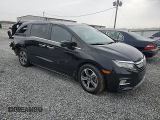 2019 Honda Odyssey Touring with VIN 5FNRL6H8XKB019879, listed as a Copart auction lot 48260545 with 164,233 mi miles and Salvage Title. Bid and sale history available at carsss.com. Image 4.