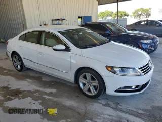 2014 Volkswagen CC R-Line with VIN WVWBP7AN6EE521807, listed as a Copart auction lot 74177764 with 142,779 mi miles and Clean Title. Bid and sale history available at carsss.com. Image 4.