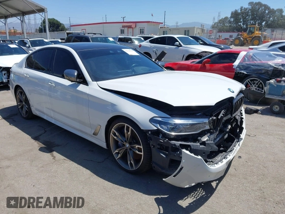 2020 BMW 5 Series M550i xDrive with VIN WBAJS7C0XLCD42738, listed as a IAAI auction lot 42326945 with 50,046 mi miles and . Bid and sale history available at DreamBid. Image 1.