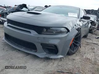 2023 Dodge Charger Scat Pack Widebody with VIN 2C3CDXGJ6PH646050, listed as a IAAI auction lot 41175513 with 7,684 mi miles and . Bid and sale history available at DreamBid. Image 18.