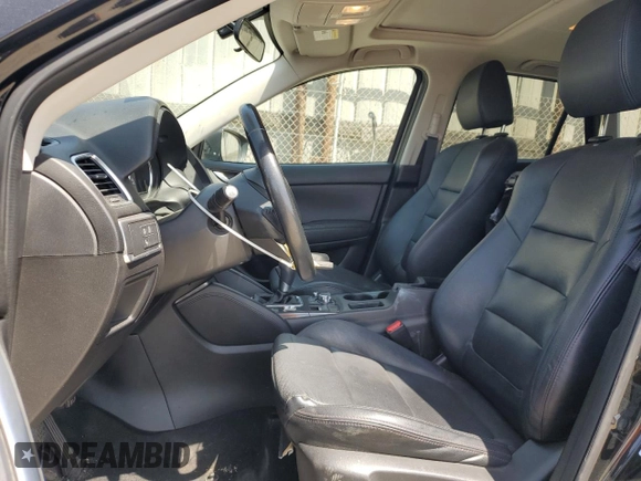 2016 Mazda CX-5 Grand Touring with VIN JM3KE2DY9G0777073, listed as a Copart auction lot 54200265 with 110,121 mi miles and Salvage Title. Bid and sale history available at carsss.com. Image 7.