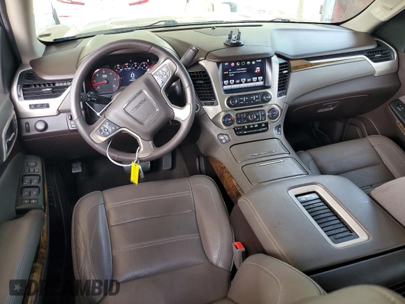 2016 GMC Yukon Denali with VIN 1GKS1CKJ9GR246441, listed as a Copart auction lot 51876925 with 158,323 mi miles and Salvage Title. Bid and sale history available at DreamBid. Image 8.