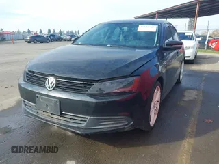 2011 Volkswagen Jetta Sedan SE w/Convenience & Sunroof PZEV with VIN 3VWDZ7AJXBM047797, listed as a IAAI auction lot 41244245 with 163,941 mi miles. Bid and sale history available at carsss.com. Image 2.