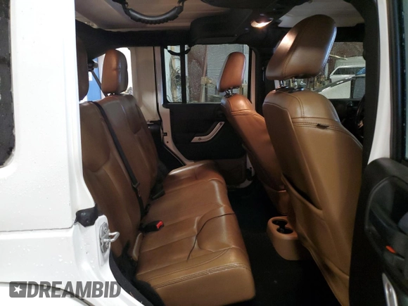 2015 Jeep Wrangler Unlimited Wrangler X with VIN 1C4HJWEG7FL671259, listed as a Copart auction lot 52334325 with 81,244 mi miles and Clean title. Bid and sale history available at DreamBid. Image 11.