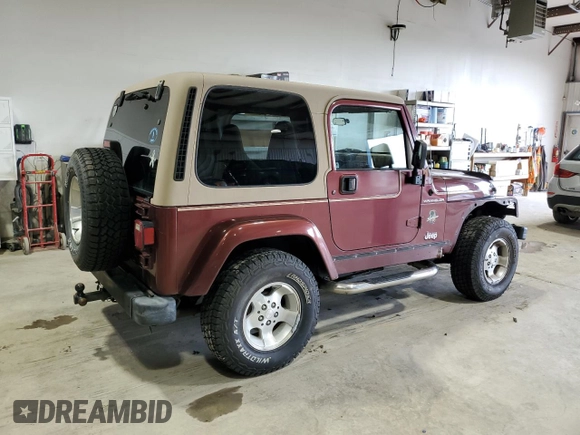 2002 Jeep Wrangler Sahara с VIN 1J4FA59S62P751858, выставлен на аукционе Copart как лот 56638165 с пробегом 270 770 миль миль и Списание • Salvage title. История ставок и продаж доступна на DreamBid. Изображение 3.