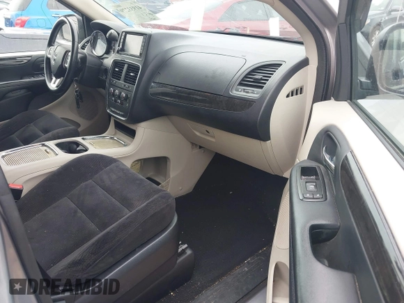 2014 Dodge Grand Caravan SXT with VIN 2C4RDGCG0ER417662, listed as a IAAI auction lot 41933279 with 156,751 mi miles and . Bid and sale history available at DreamBid. Image 5.