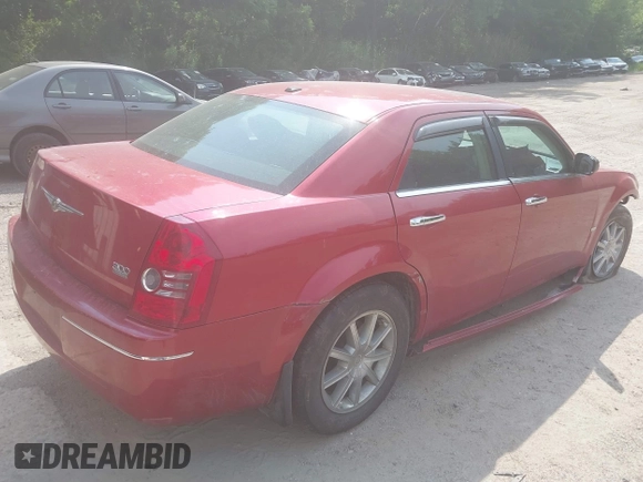 2010 Chrysler 300 Touring with VIN 2C3CK5CV0AH331268, listed as a IAAI auction lot 39666088 with 148,488 mi miles. Bid and sale history available at carsss.com. Image 4.