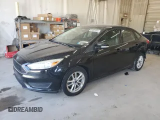 2015 Ford Focus SE with VIN 1FADP3F24FL344774, listed as a Copart auction lot 61931065 with 106,354 mi miles and Salvage title. Bid and sale history available at DreamBid. Image 1.