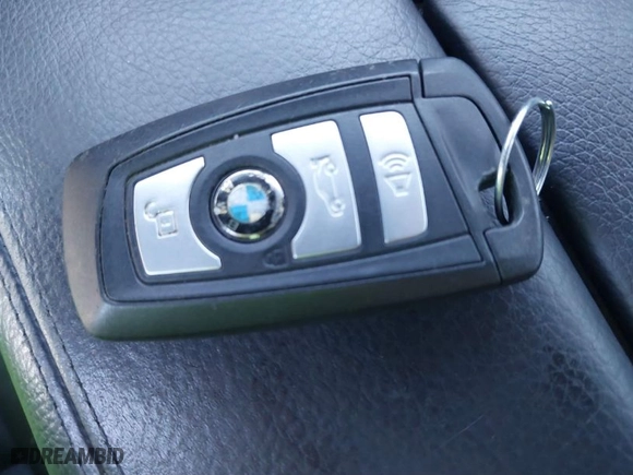 2012 BMW 5 Series 528i with VIN WBAXG5C50CDX03770, listed as a IAAI auction lot 41680812 with 168,715 mi miles. Bid and sale history available at carsss.com. Image 11.