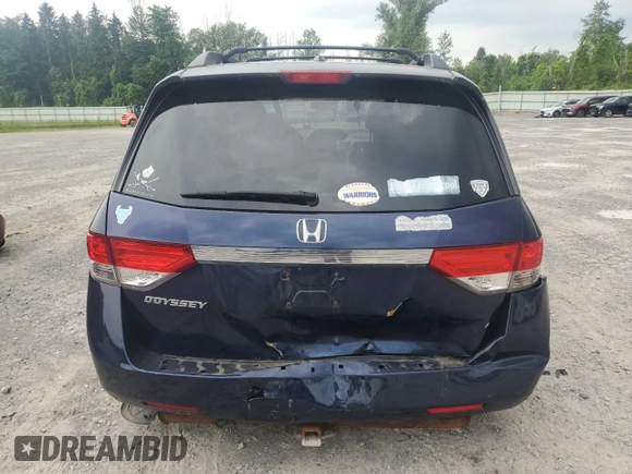 2014 Honda Odyssey EX-L with VIN 5FNRL5H63EB013483, listed as a Copart auction lot 63002435 with 127,059 mi miles and Salvage title. Bid and sale history available at DreamBid. Image 6.