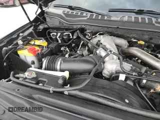 2020 Ford F-250 XL z VIN 1FT7W2BTXLED29442, wystawiony jako Copart lot #70496205 z przebiegiem 91 327 mil mil oraz Szkoda całkowita • Salvage title. Historia ofert i sprzedaży dostępna na DreamBid. Obrazek 13.