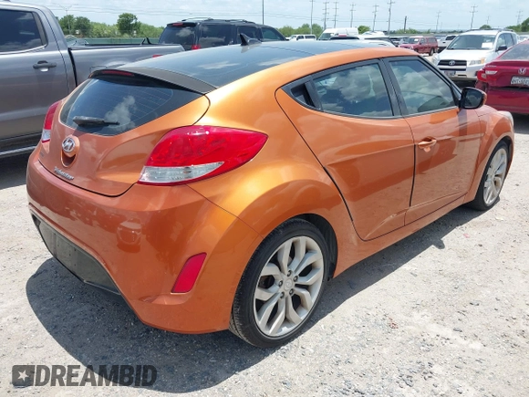 2013 Hyundai Veloster w/Black Int with VIN KMHTC6AD0DU147017, listed as a IAAI auction lot 42707858 with 115,130 mi miles and . Bid and sale history available at DreamBid. Image 4.