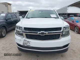 2015 Chevrolet Tahoe LT with VIN 1GNSCBKC4FR530776, listed as a IAAI auction lot 41754350 with 174,694 mi miles and . Bid and sale history available at DreamBid. Image 12.