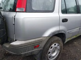 2001 Honda CR-V LX with VIN JHLRD28441C000682, listed as a IAAI auction lot 42019317 with 214,884 mi miles. Bid and sale history available at carsss.com. Image 6.
