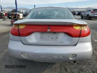 2001 Saturn SC z VIN 1G8ZY14701Z255767, wystawiony jako Copart lot #53727985 z przebiegiem 137 776 mil mil oraz Szkody całkowita. Historia ofert i sprzedaży dostępna na DreamBid. Obrazek 6.